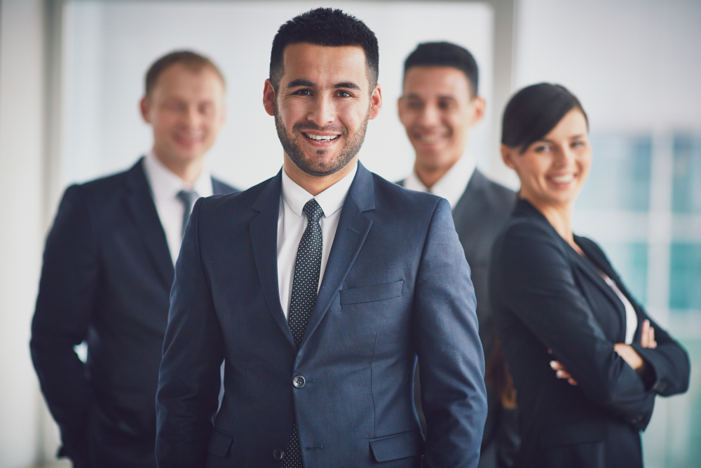 confident-business-team-with-leader